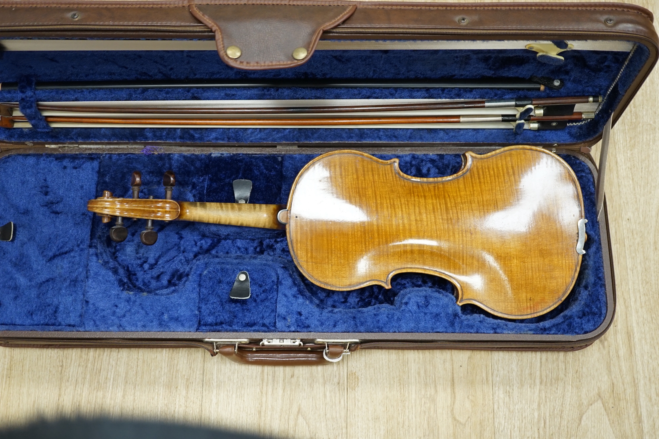 A cased 1830s violin by Didier Nicolas L'aine, branded inside the body, body length 36cm, with two bows, one bow stamped Louis Bazin CITES Submission references 7WRVMZ9B and F37GW7ZR